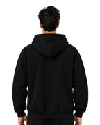 Back view of a plain black pullover hoodie