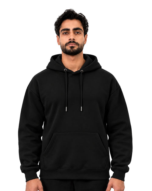 Front view of a black pullover hoodie with drawstring hood and kangaroo pocket
